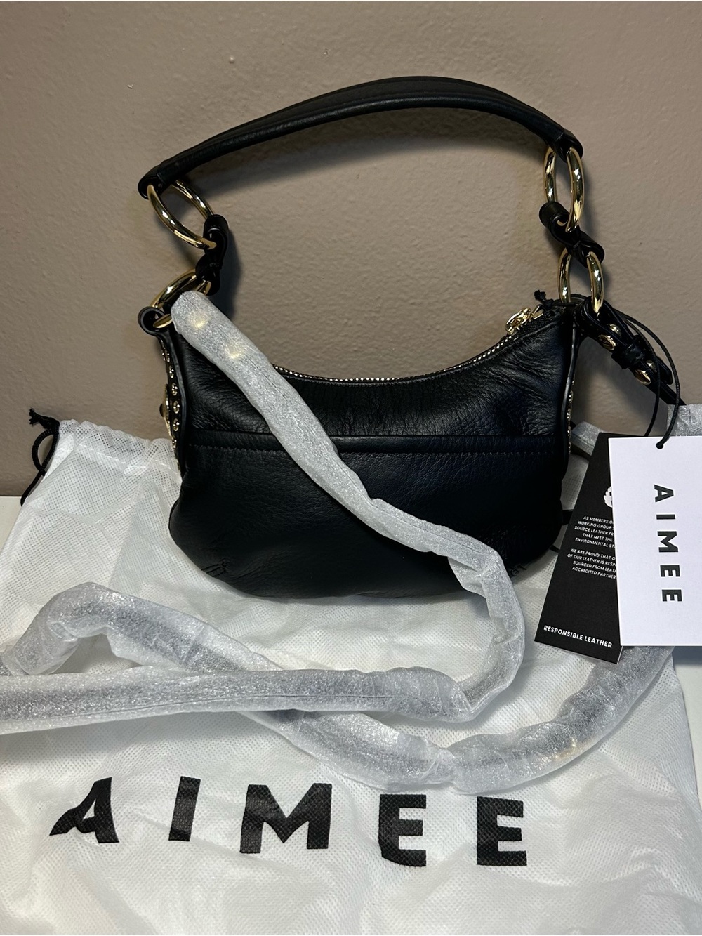 Aimee Kestenberg Roma Mini Black Leather Crossbody Bag studs gold hardware